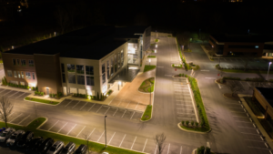 Fresno medical clinic exterior at night with empty parking lot highlighting the after-hours security gap protecting millions in medical equipment and patient records